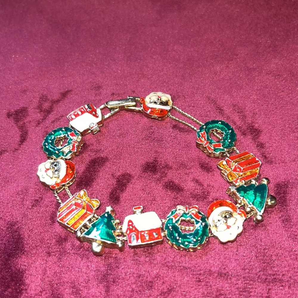 Avon Christmas Slide Charm Bracelet.